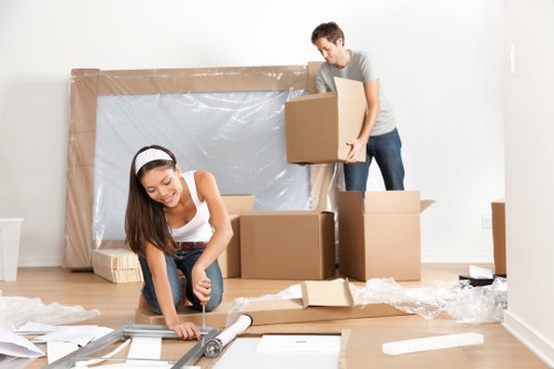 Local house removals support in Tufnell Park with a moving van and packed boxes