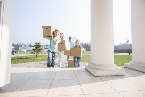Careful loading of boxes and furniture for a north London move