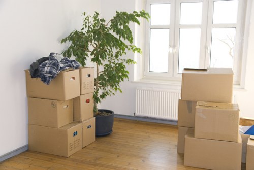 Packed office boxes and equipment ready for transport