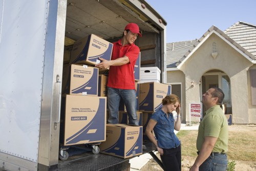 Local movers handling boxes and furniture near Tufnell Park