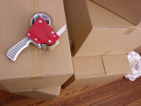 Boxes and office furniture prepared for a local business move