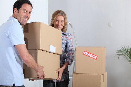Movers using protective equipment during a safe house move